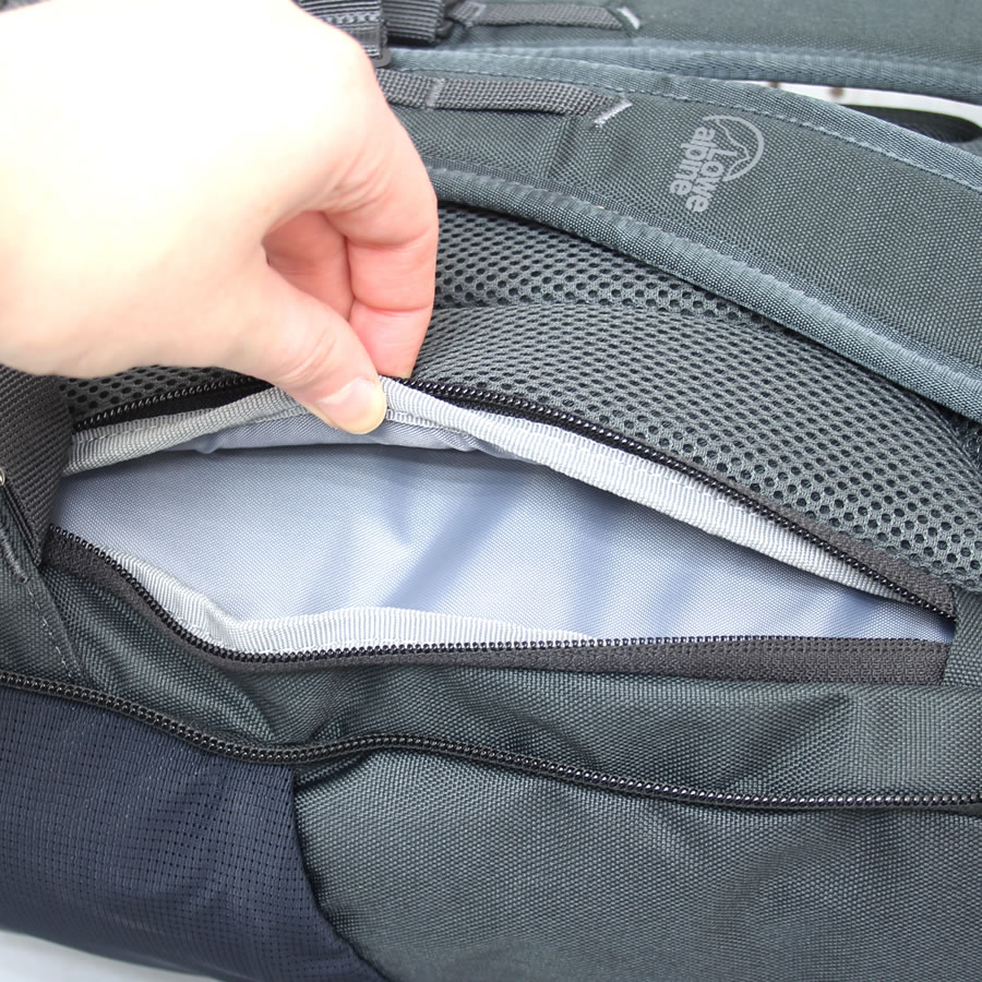 hidden pocket in daypack back panel