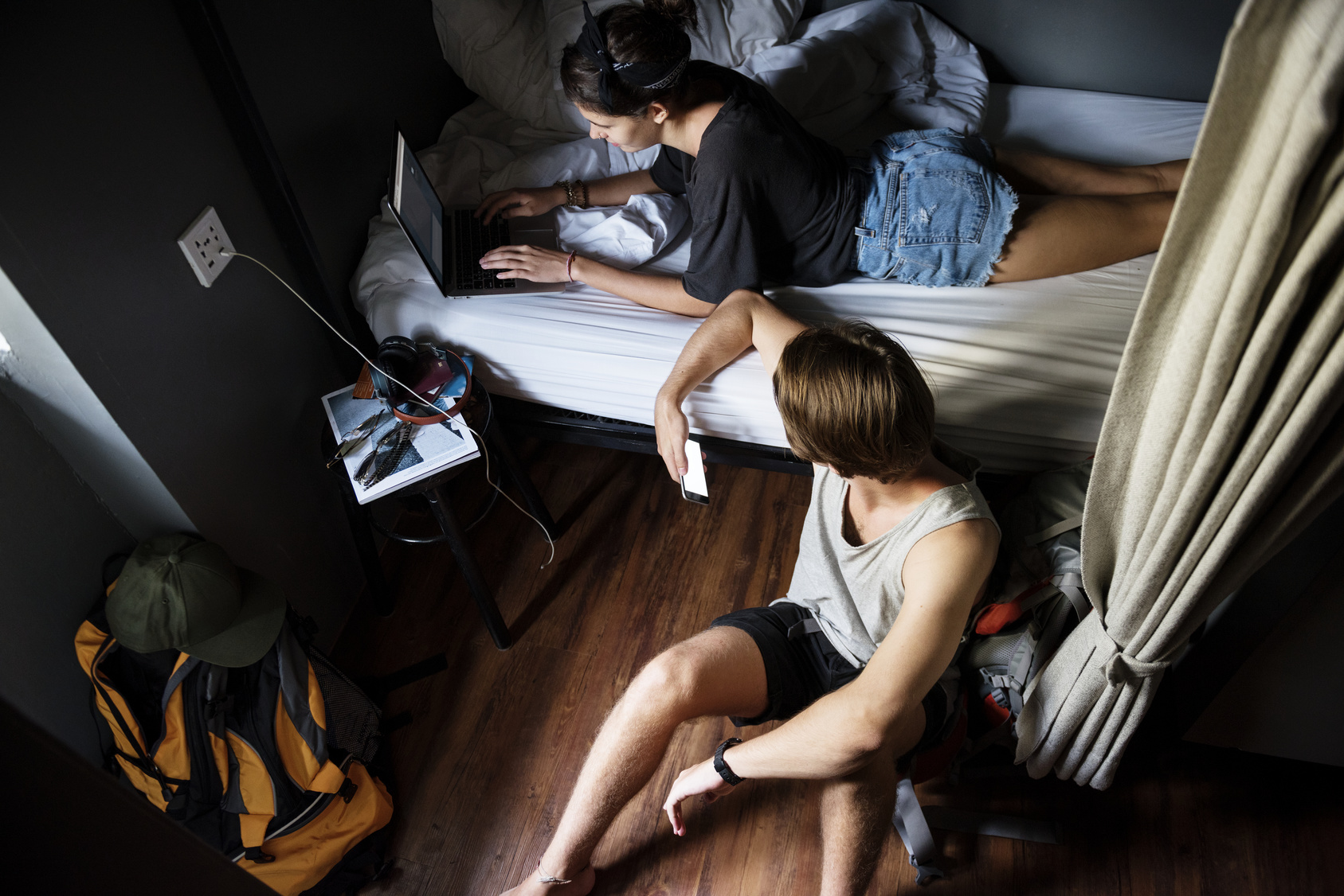 backpackers in hostel dorm