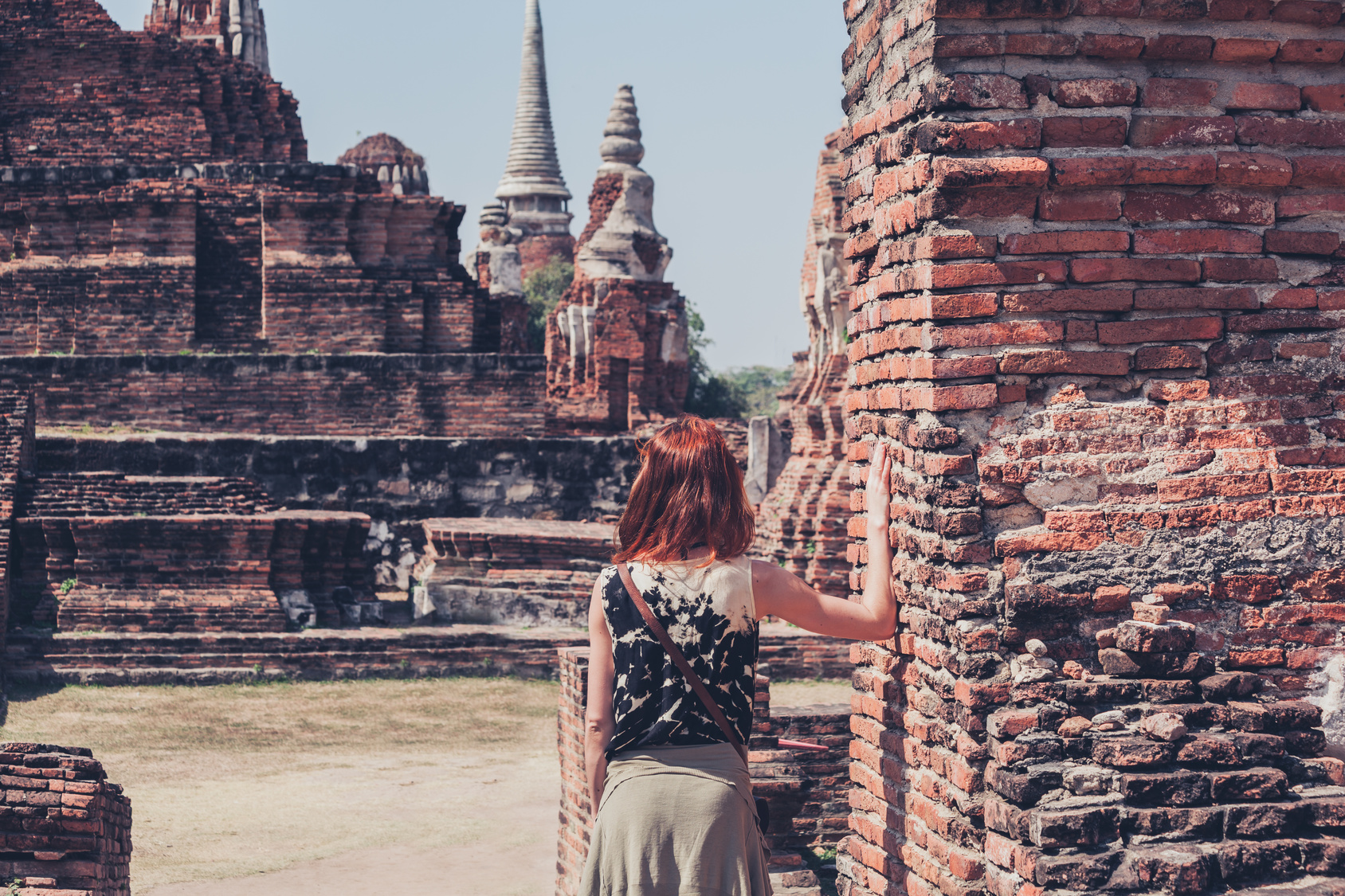 Woman exploring ancient ruins